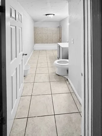 a bathroom with a sink and a toilet