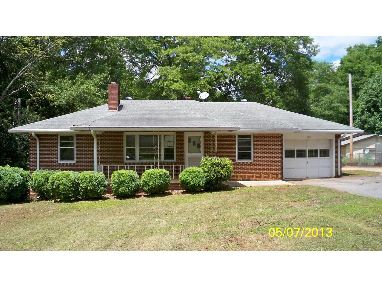 248 Scott Street Commerce, GA 30529 - Photo 1 of 1 a house view with a garden space