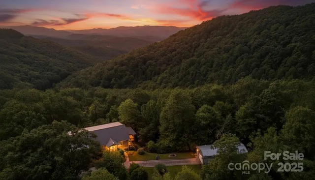a view of a city with mountains in the background