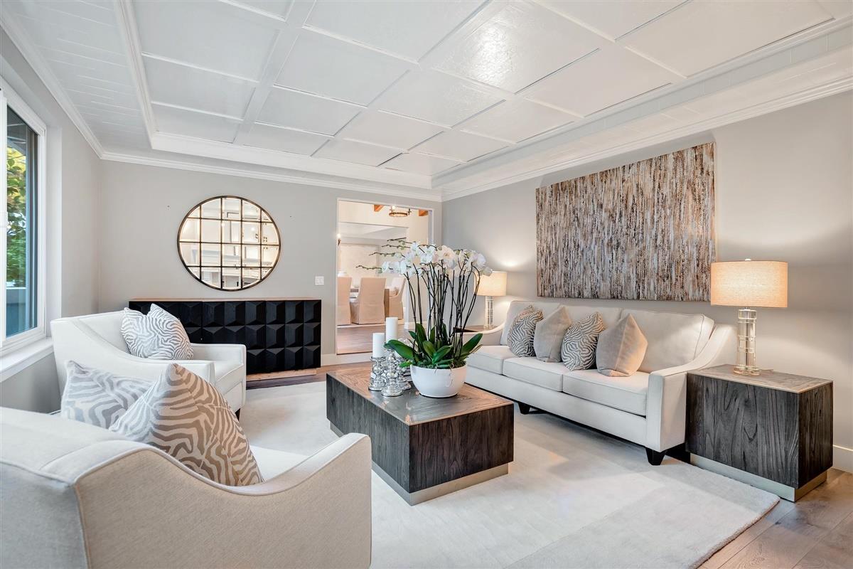 14355 Quito Road Saratoga, CA 95070 - Photo 23 of 50 a living room with furniture potted plant and a large window