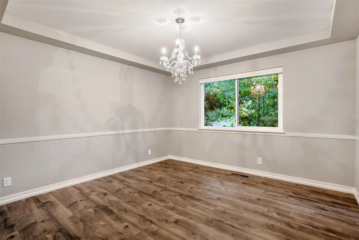 14355 Quito Road Saratoga, CA 95070 - Photo 39 of 50 wooden floor in an empty room with a window