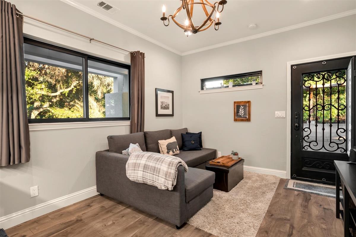 14355 Quito Road Saratoga, CA 95070 - Photo 42 of 50 a living room with furniture and a large window