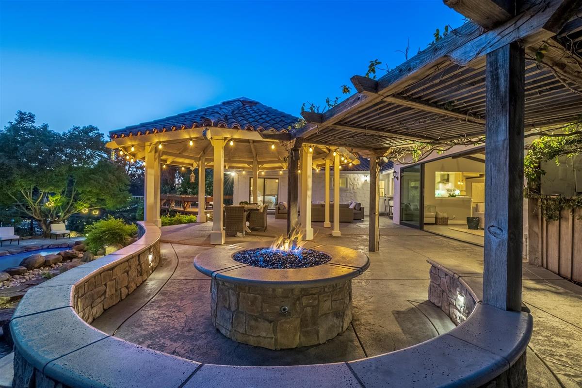 14355 Quito Road Saratoga, CA 95070 - Photo 48 of 50 a view of a house with a swimming pool and a sitting space