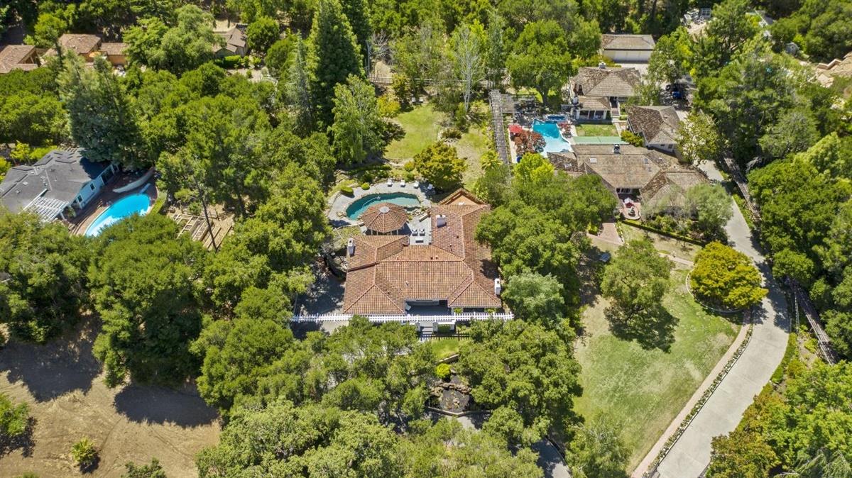 14355 Quito Road Saratoga, CA 95070 - Photo 6 of 50 an aerial view of a house with a yard