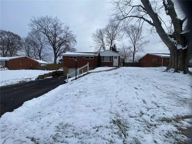 a view of house with outdoor space