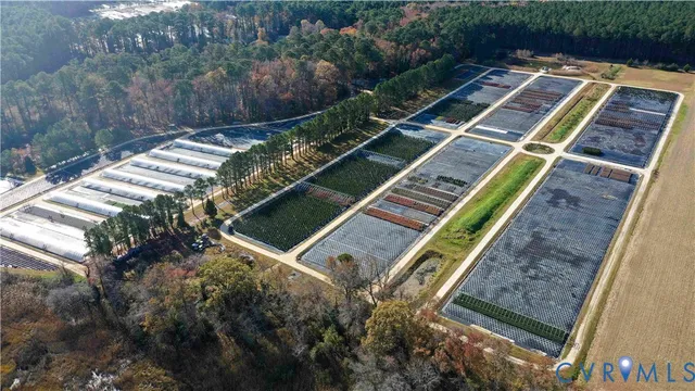 a view of a balcony with chairs and wooden floor