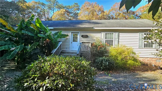 a view of a backyard with plants