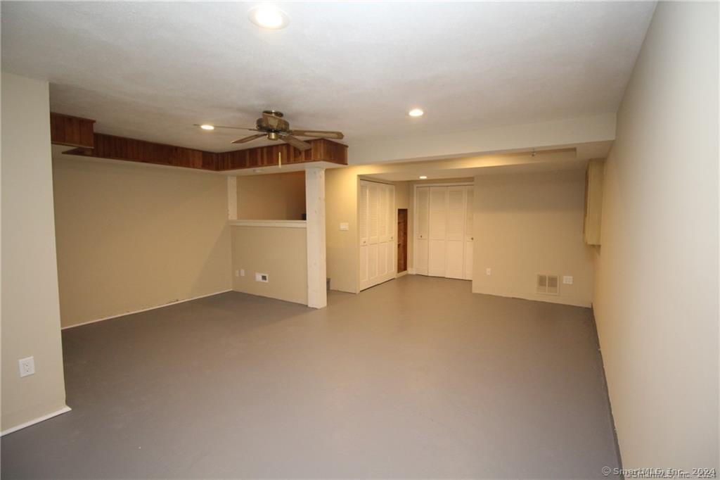 7 Woods Way, Unit 7 Woodbury, CT 06798 - Photo 17 of 19 a view of a room with a hallway