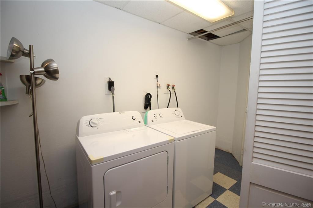 7 Woods Way, Unit 7 Woodbury, CT 06798 - Photo 18 of 19 a utility room with dryer and washer