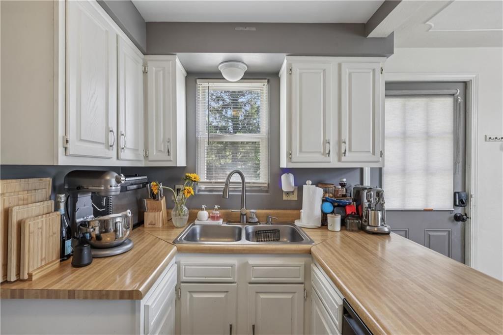 550 McClane Farm Road Washington, PA 15301 - Photo 12 of 31 a kitchen with a sink and cabinets
