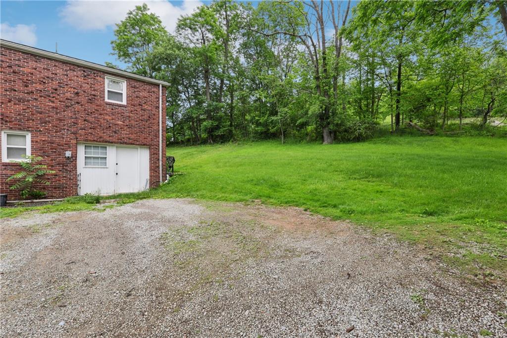 550 McClane Farm Road Washington, PA 15301 - Photo 29 of 31 a view of a house with backyard and garden