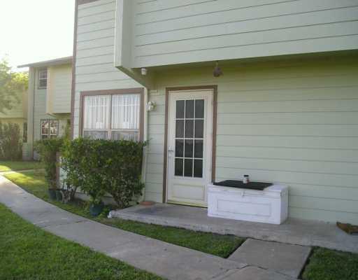 a front view of a house having yard