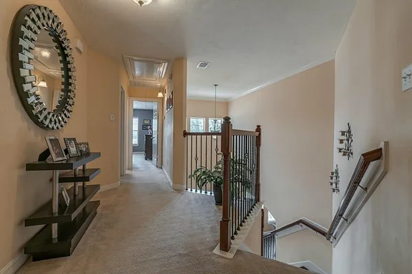 a view of a hallway with workspace
