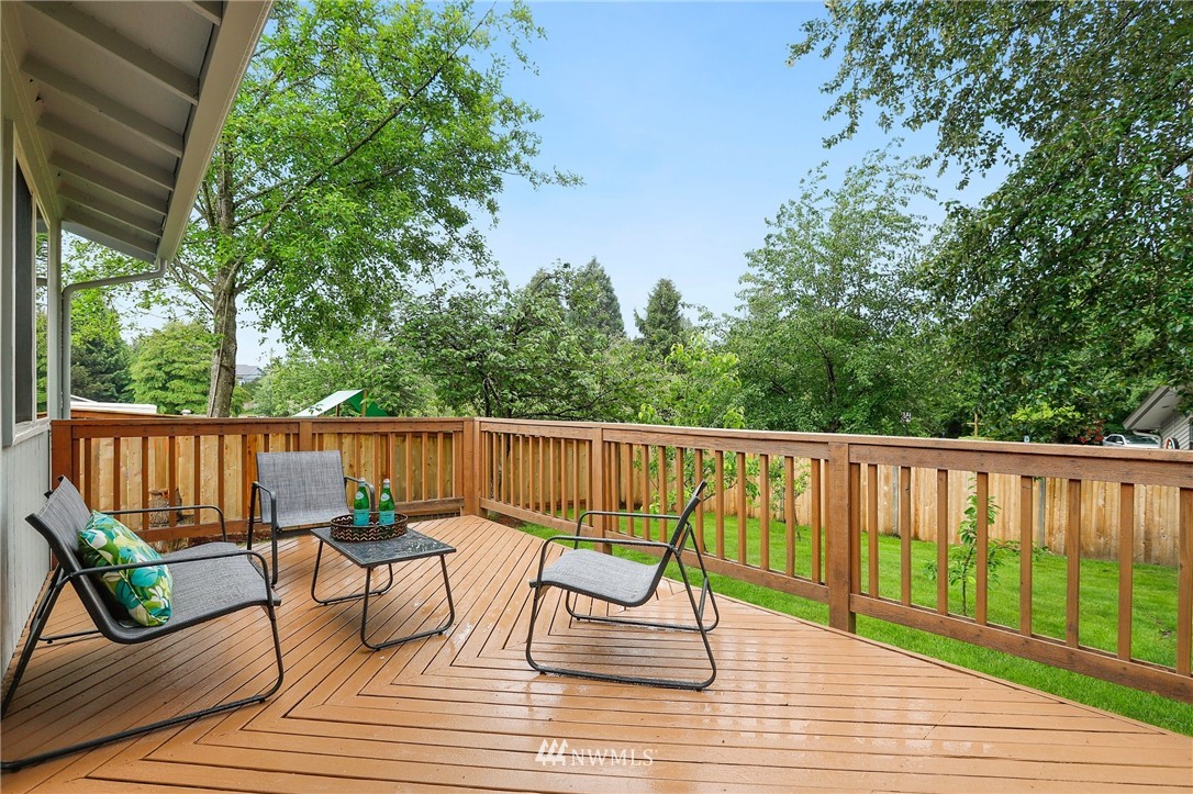 17830 28th Avenue Southeast Bothell, WA 98012 - Photo 19 of 25 a view of balcony with wooden floor and outdoor seating