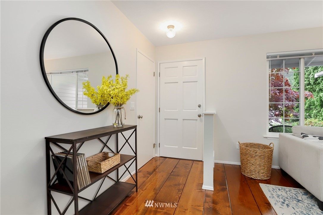 17830 28th Avenue Southeast Bothell, WA 98012 - Photo 3 of 25 a view of a livingroom with furniture and front door