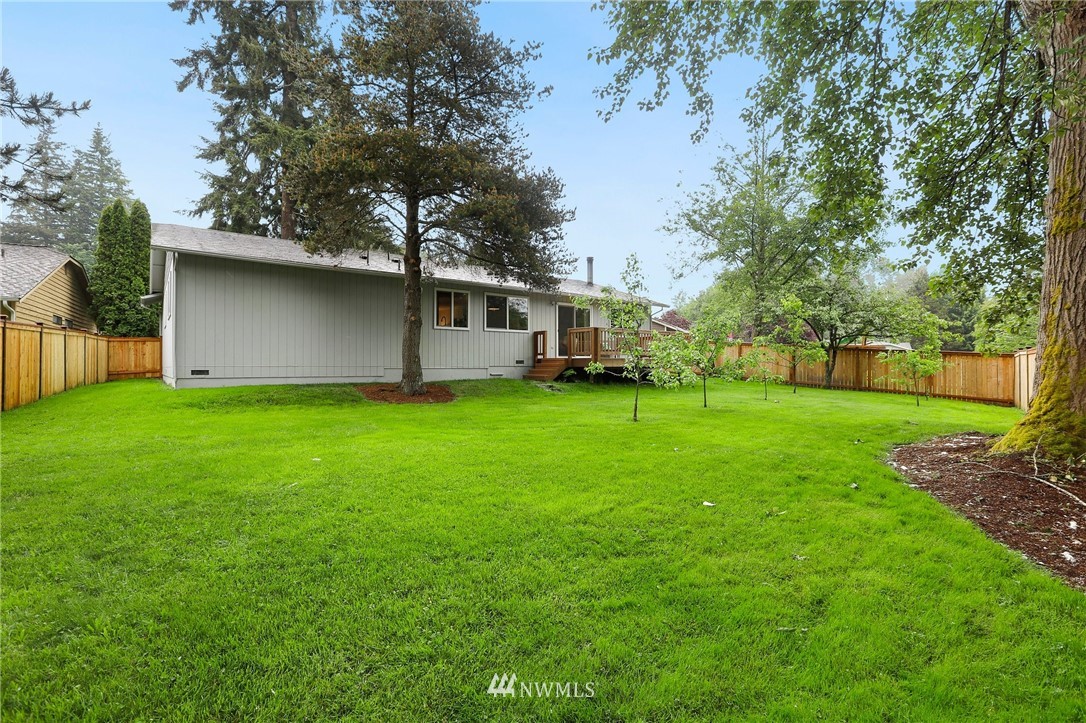 17830 28th Avenue Southeast Bothell, WA 98012 - Photo 21 of 25 a view of a house with a yard porch and a tree