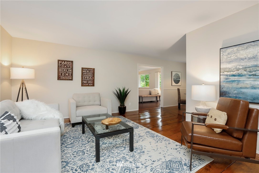 17830 28th Avenue Southeast Bothell, WA 98012 - Photo 5 of 25 a living room with furniture and a rug