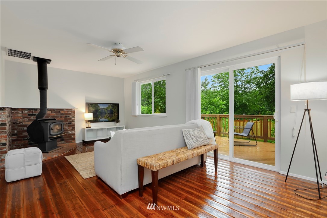 17830 28th Avenue Southeast Bothell, WA 98012 - Photo 10 of 25 a living room with furniture and a flat screen tv