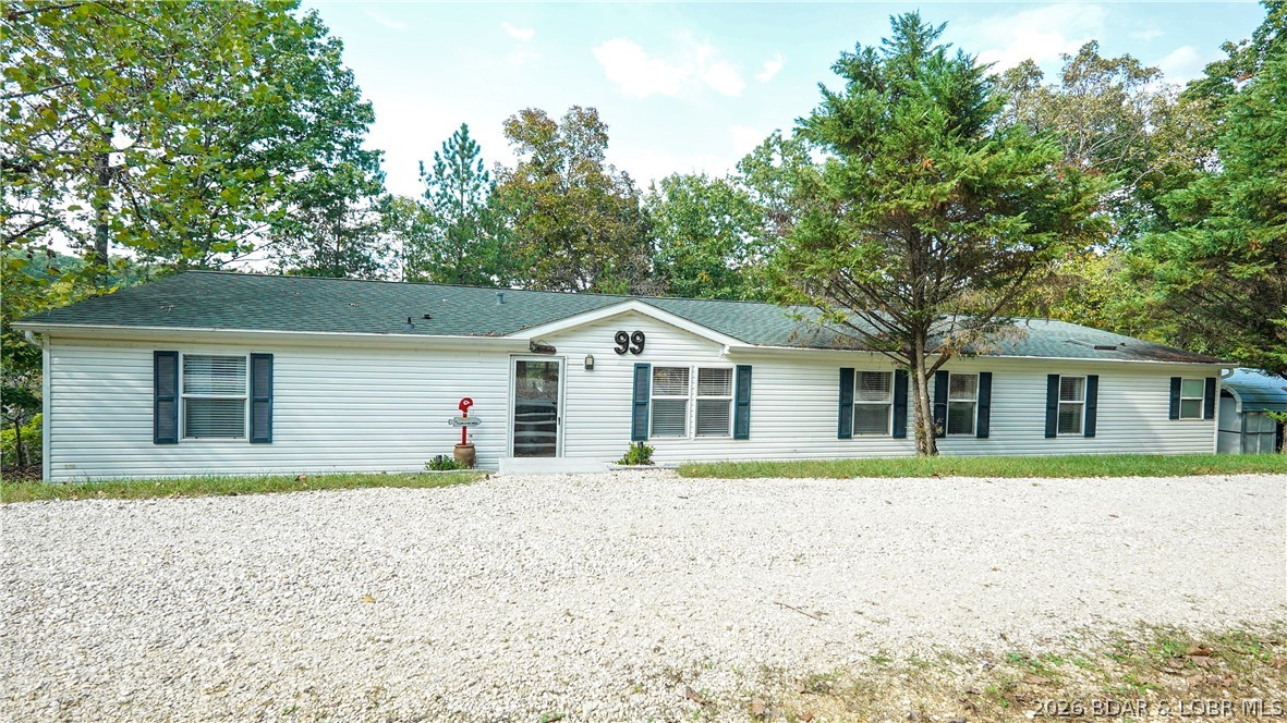 99 Rustic Woods Road Sunrise Beach, MO 65079 - Photo 1 of 48