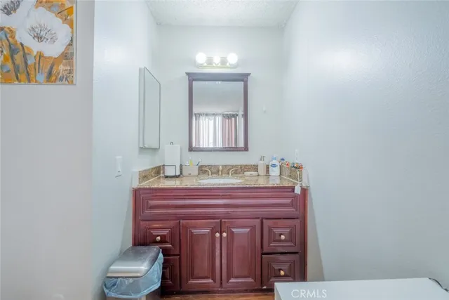 a bathroom with a sink and a toilet