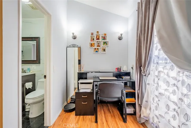 a view of a workspace with furniture and workspace