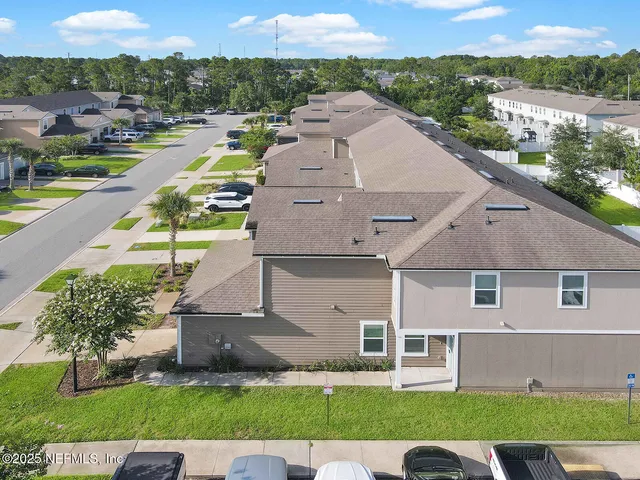 a view of a house with a garden