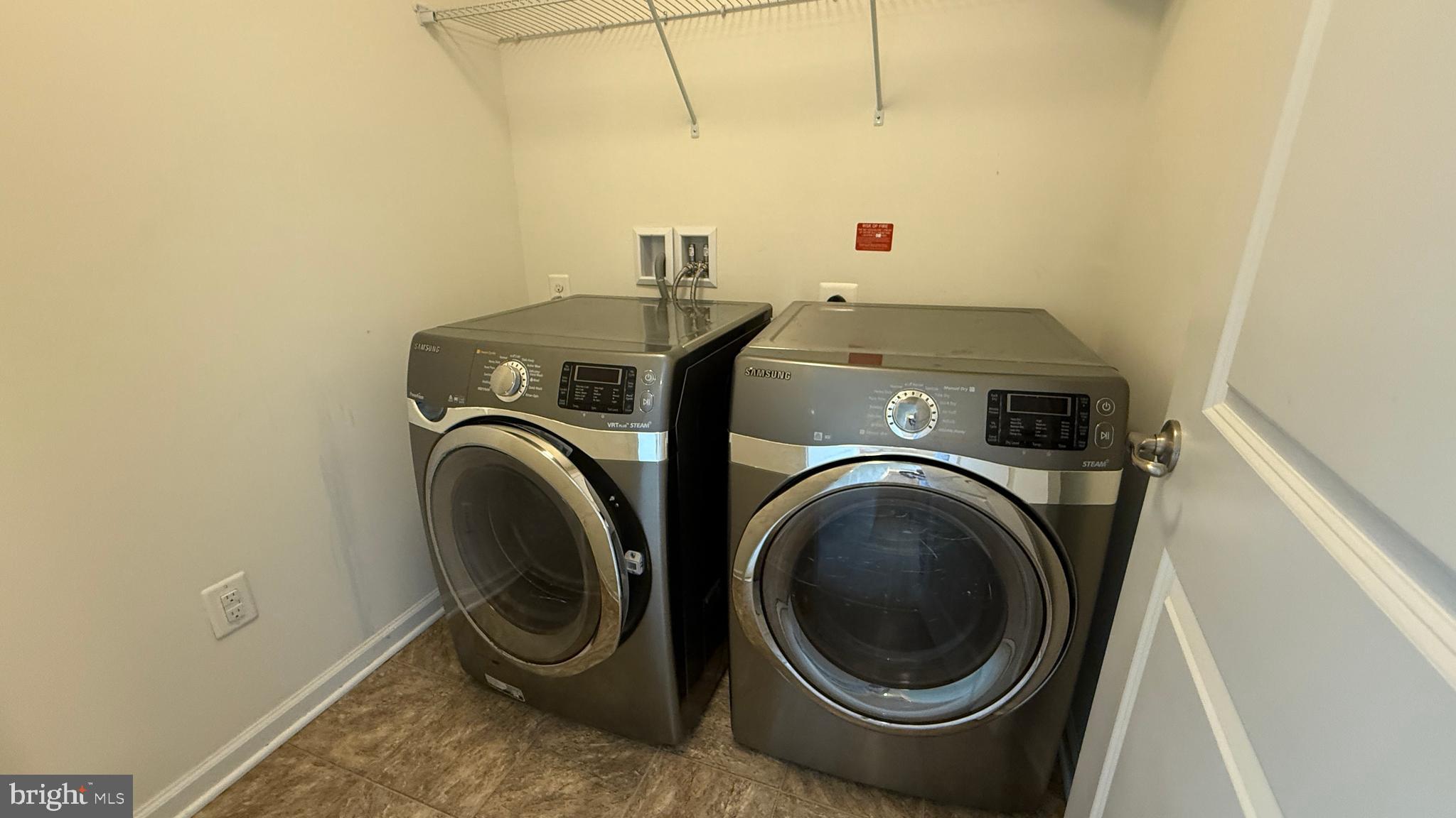 12421 Mays Quarter Road Woodbridge, VA 22192 - Photo 29 of 30 a utility room with dryer and washer