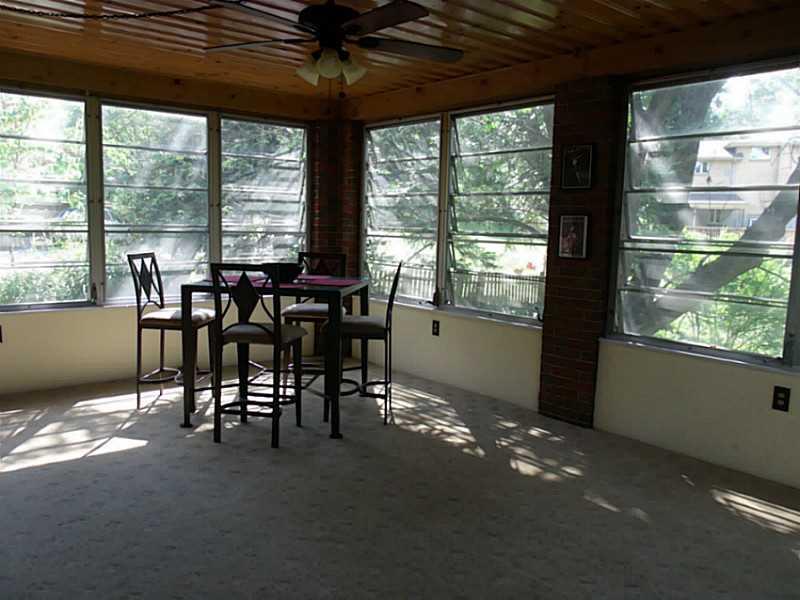 923 Girard Road Whitehall, PA 15227 - Photo 11 of 25 Sunroom. Three Season Room through French Doors in DR