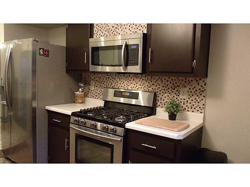 923 Girard Road Whitehall, PA 15227 - Photo 7 of 25 Kitchen. New SS Appliances & Tile Backsplash