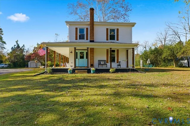 a view of a house with a swimming pool