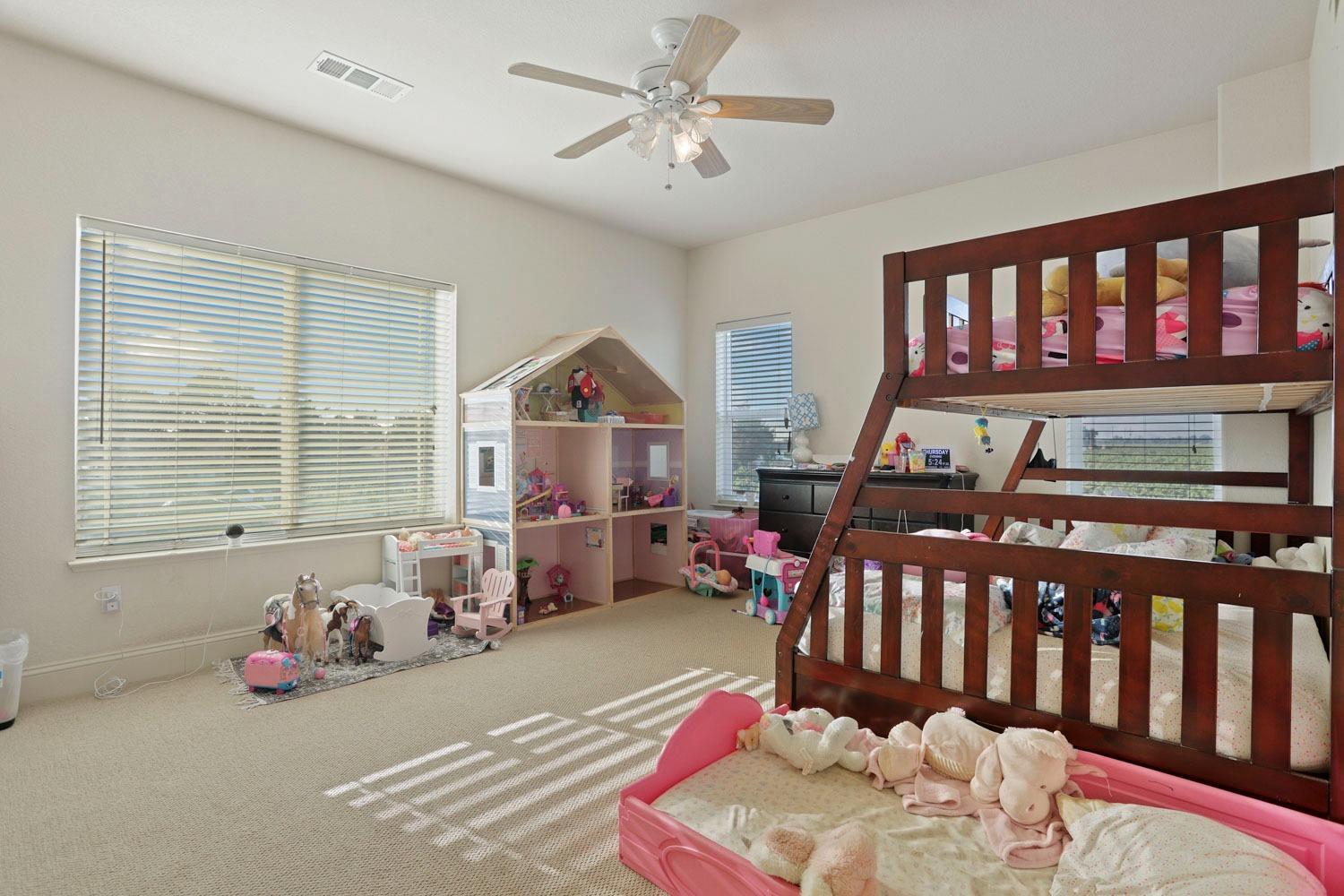16160 Moore Road Lodi, CA 95242 - Photo 24 of 38 a bedroom with furniture and a window