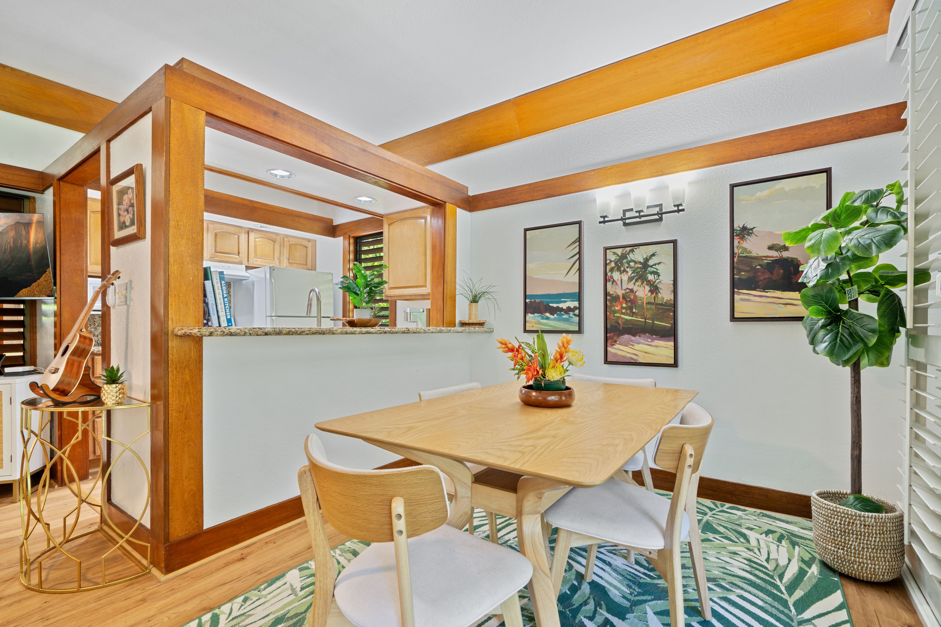2253 Poipu Road, Unit 419 Koloa, HI 96756 - Photo 11 of 30 a view of a dining room with furniture and window