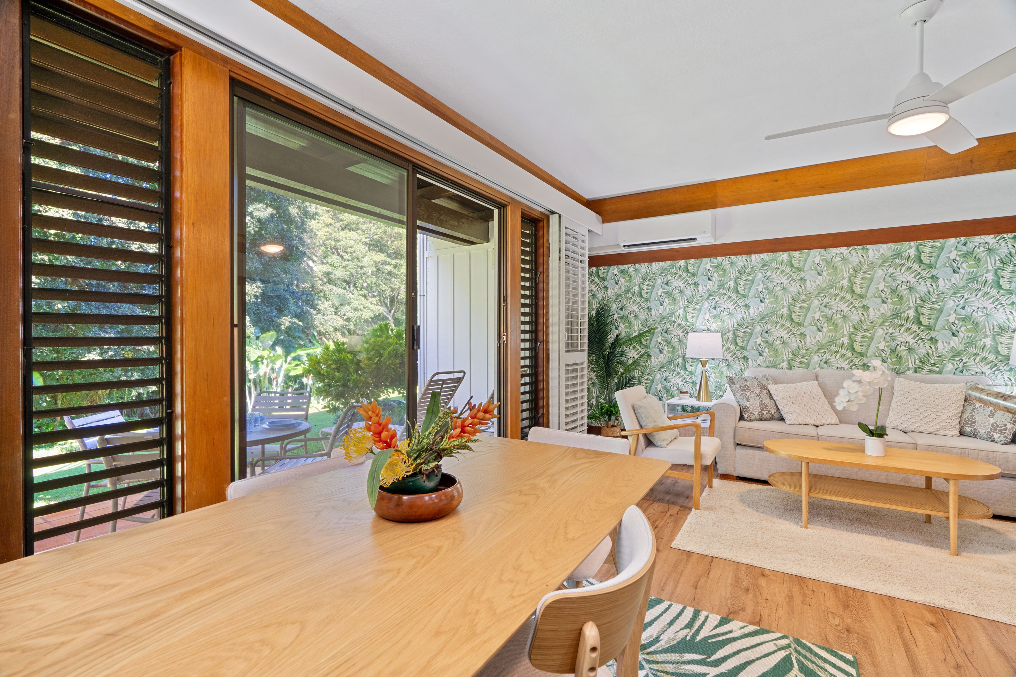2253 Poipu Road, Unit 419 Koloa, HI 96756 - Photo 13 of 30 a living room with furniture and a large window