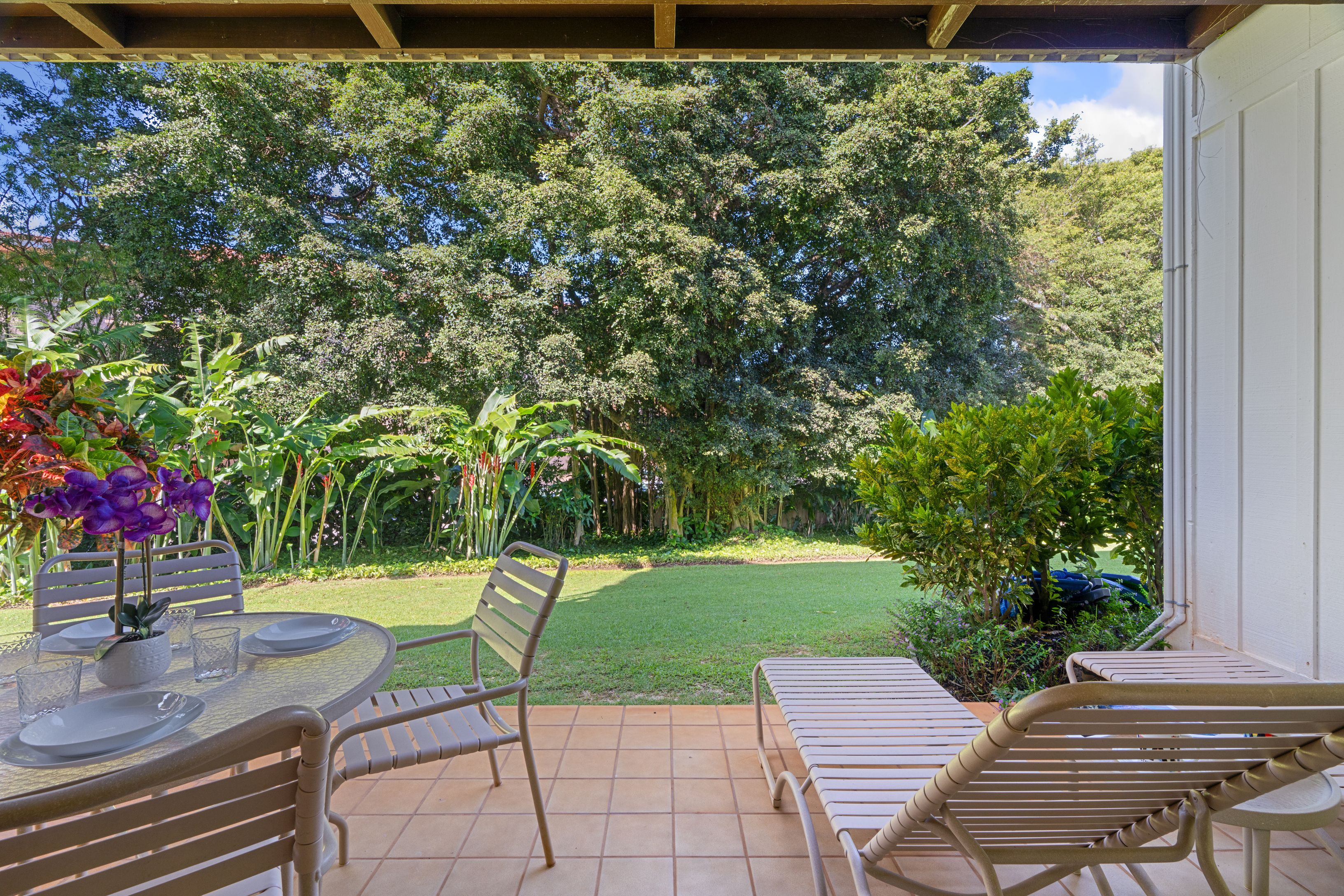 2253 Poipu Road, Unit 419 Koloa, HI 96756 - Photo 27 of 30 a view of a backyard with sitting area
