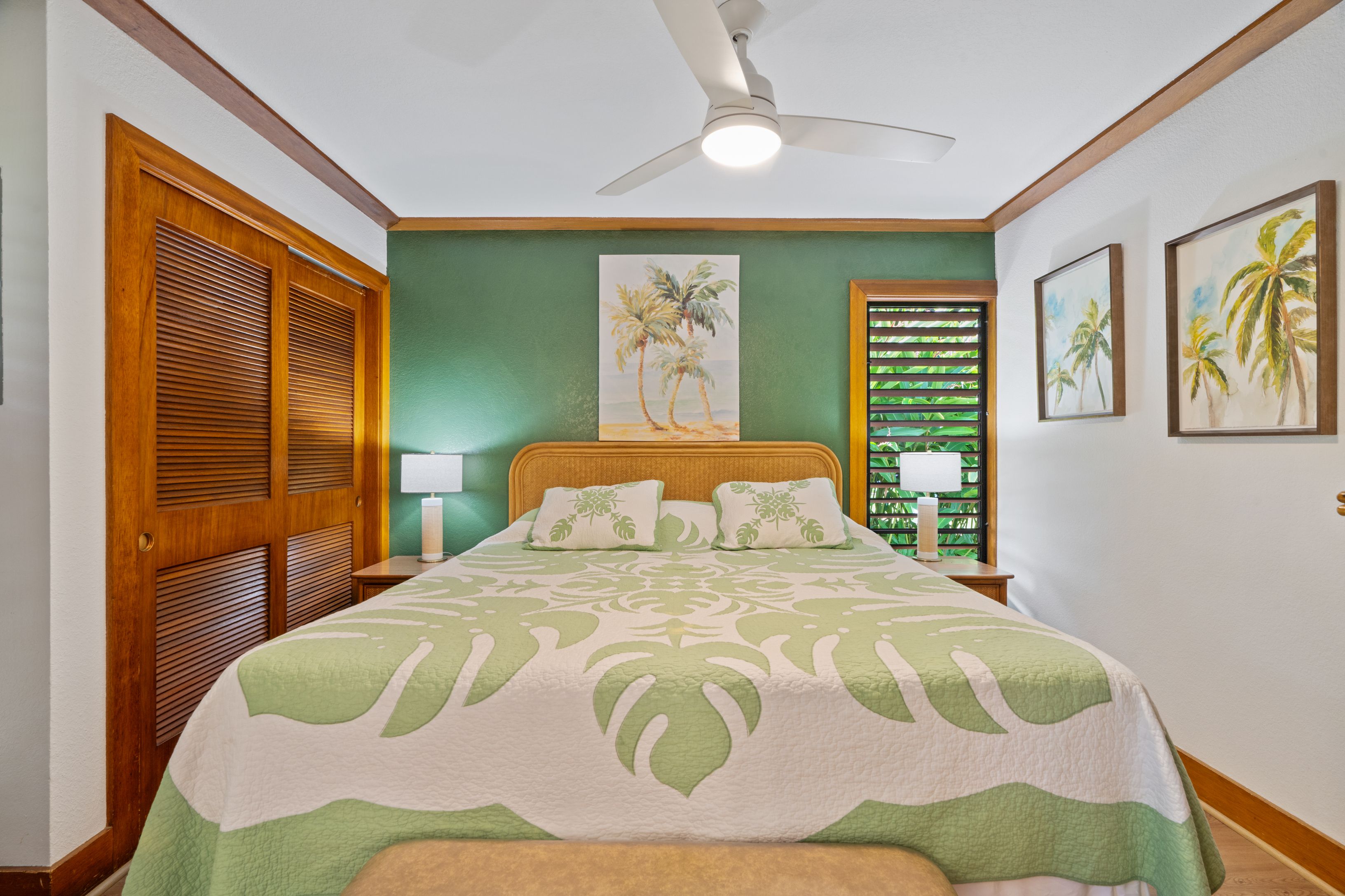 2253 Poipu Road, Unit 419 Koloa, HI 96756 - Photo 4 of 30 a bedroom with a bed and wooden floor