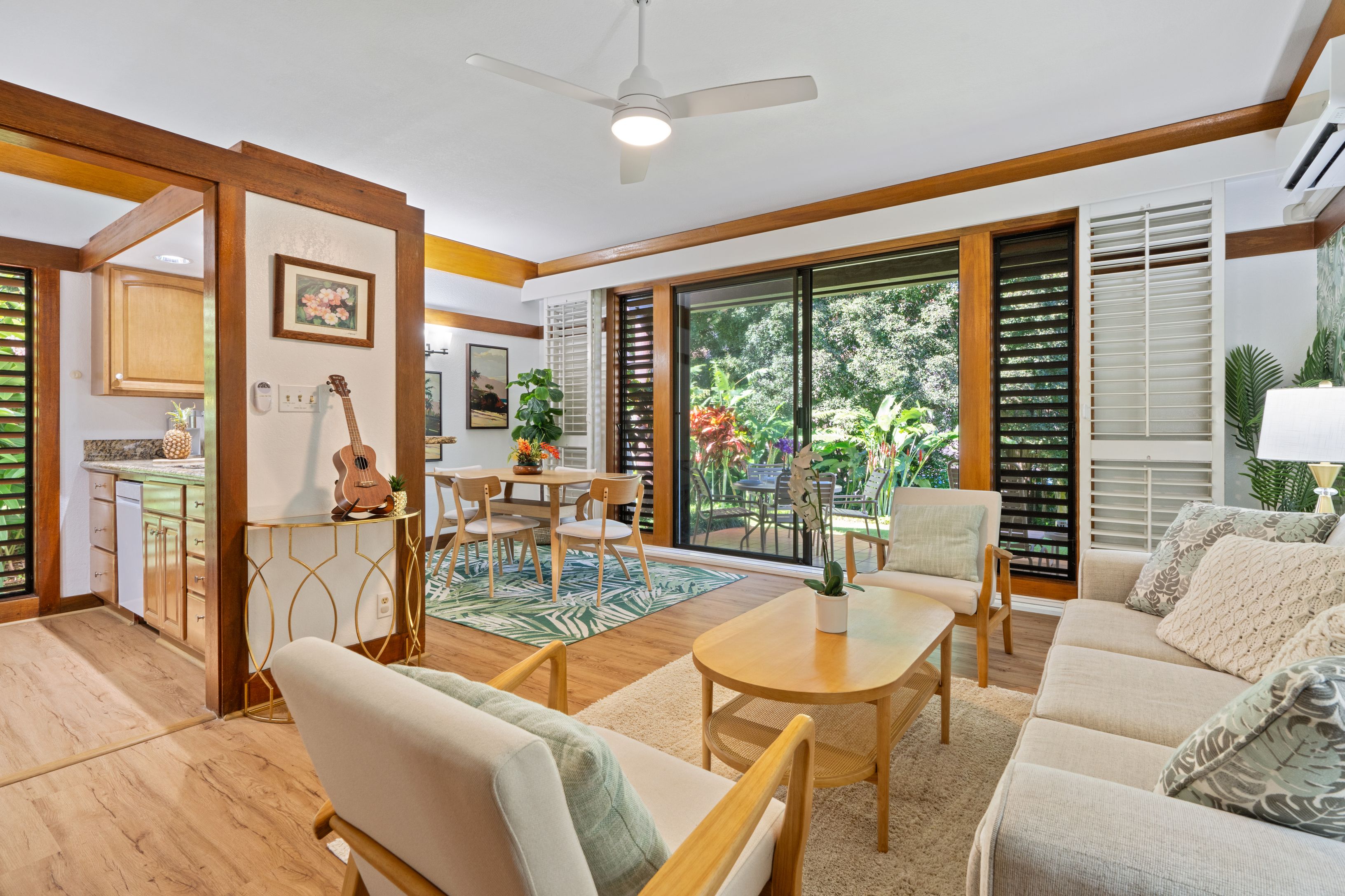 2253 Poipu Road, Unit 419 Koloa, HI 96756 - Photo 9 of 30 a dining room with furniture water view and large windows