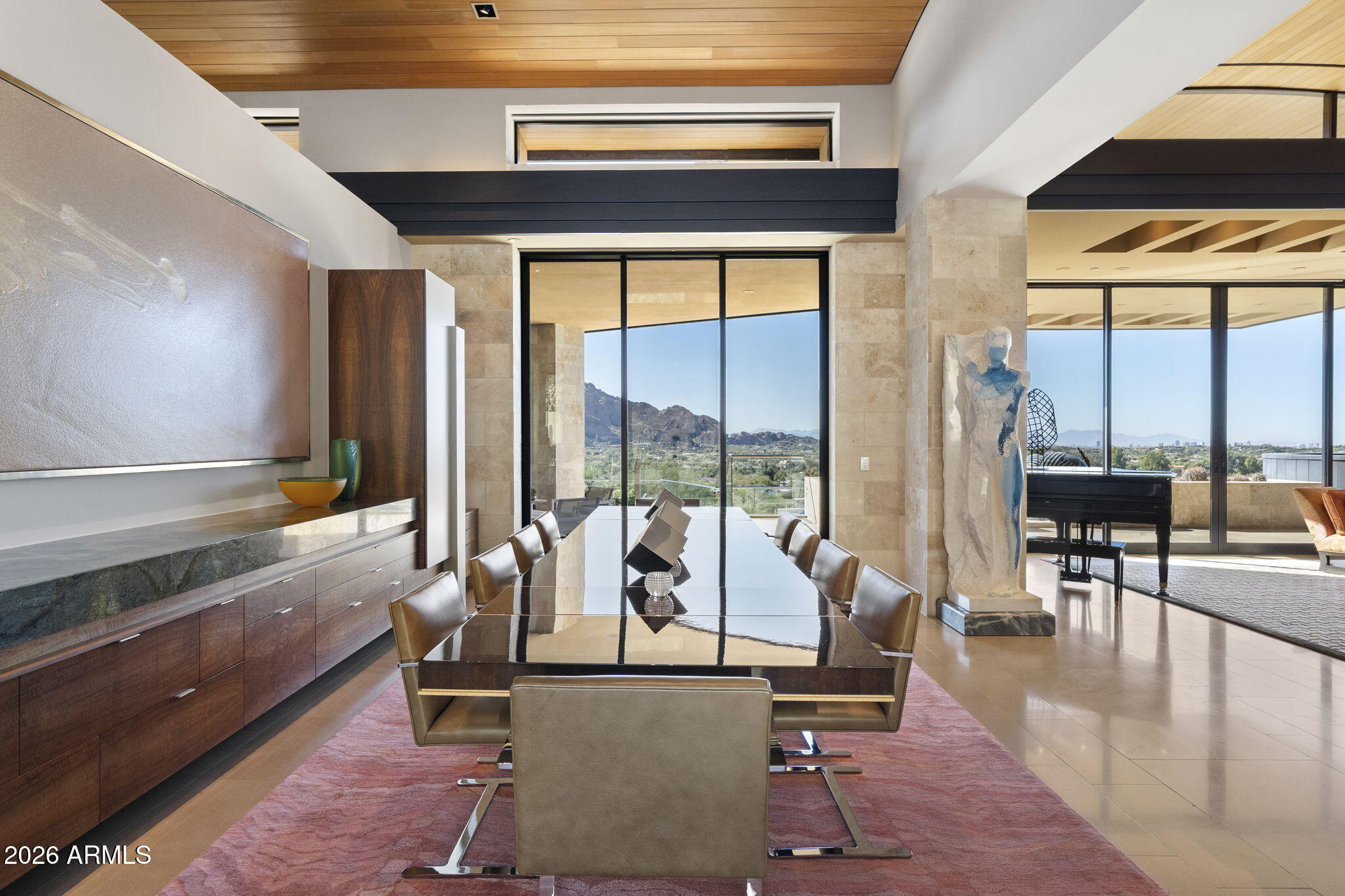 5248 East Arroyo Road Paradise Valley, AZ 85253 - Photo 22 of 31 a living room with furniture and floor to ceiling windows