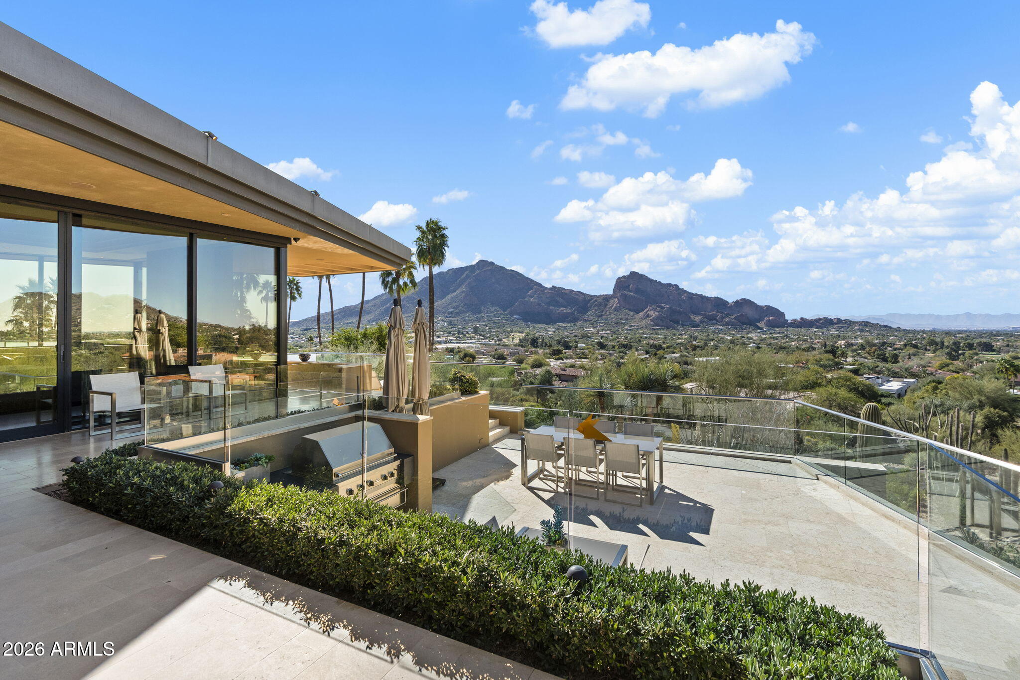 5248 East Arroyo Road Paradise Valley, AZ 85253 - Photo 24 of 31 a view of a swimming pool with a patio