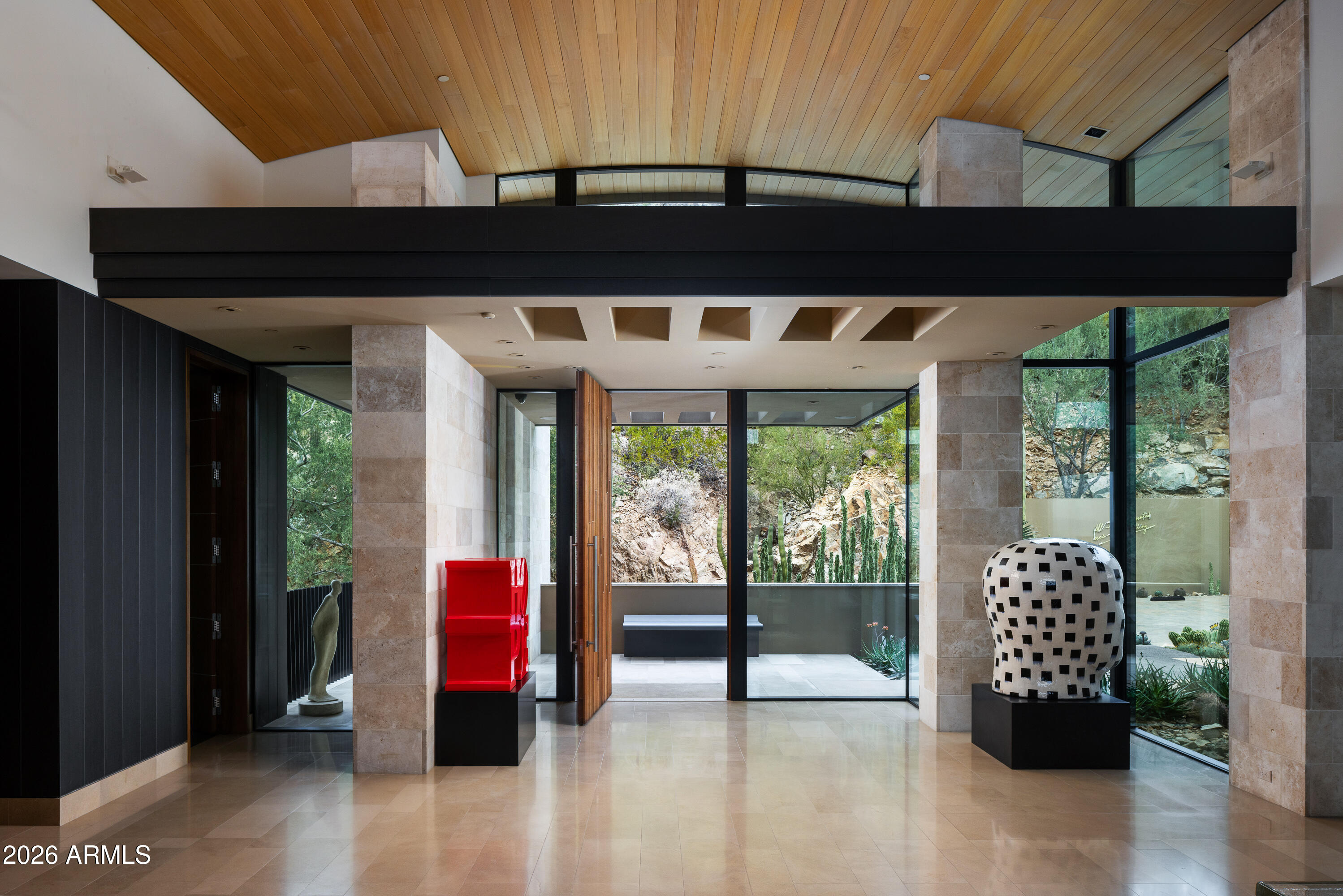 5248 East Arroyo Road Paradise Valley, AZ 85253 - Photo 30 of 31 a living room with furniture and a floor to ceiling window