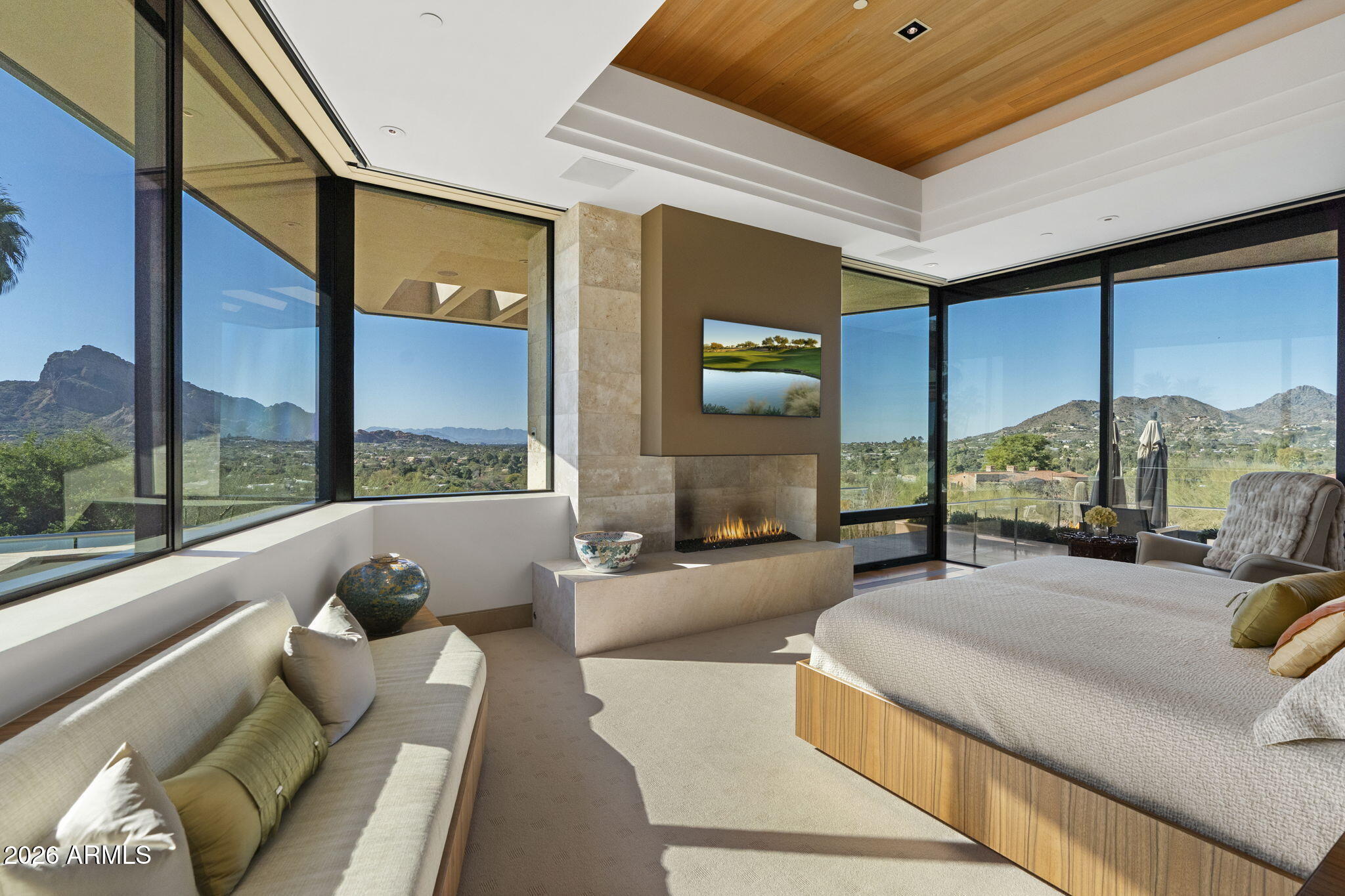 5248 East Arroyo Road Paradise Valley, AZ 85253 - Photo 4 of 31 a spacious bedroom with a large window and a balcony