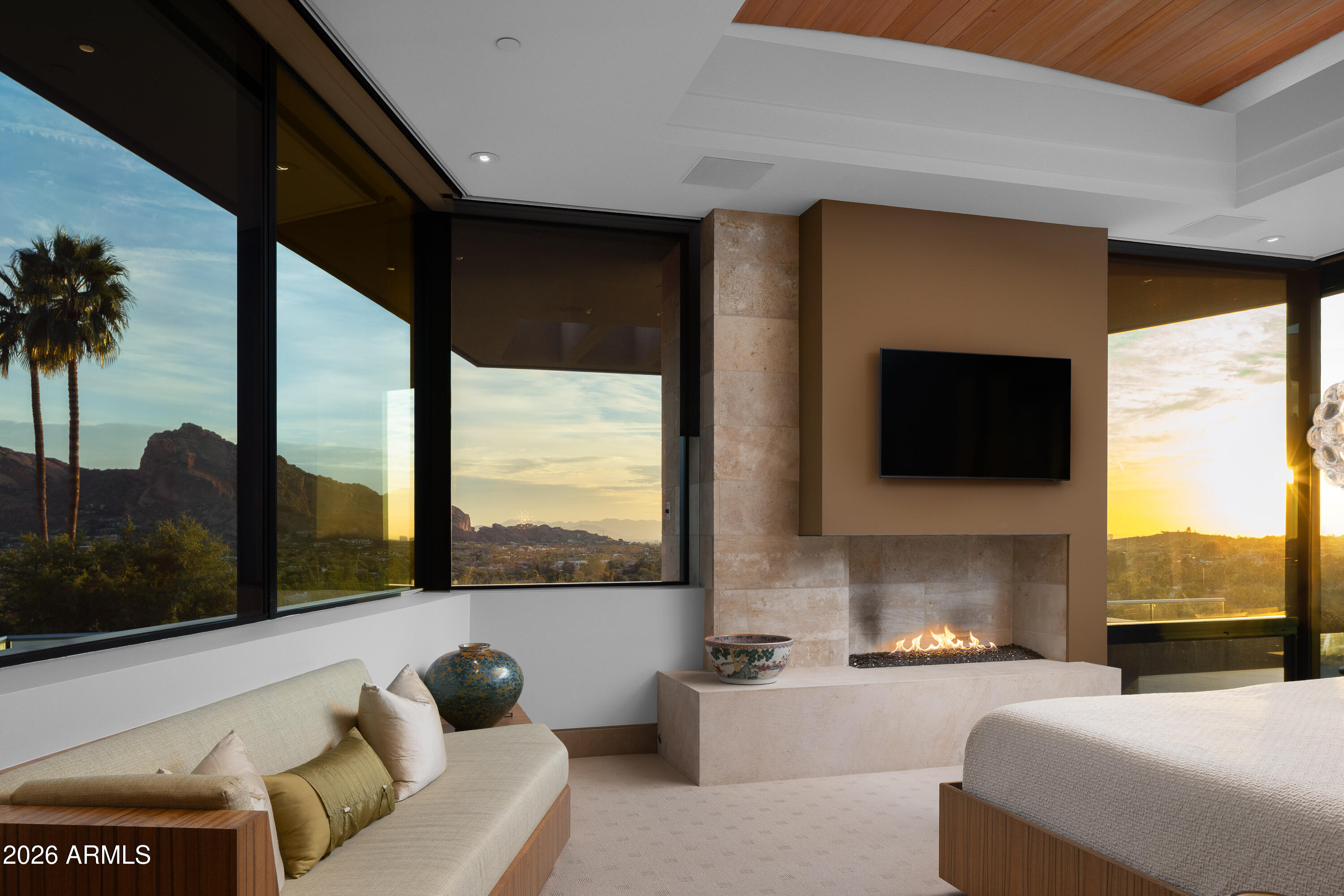 5248 East Arroyo Road Paradise Valley, AZ 85253 - Photo 5 of 31 a living room with furniture fireplace and flat screen tv