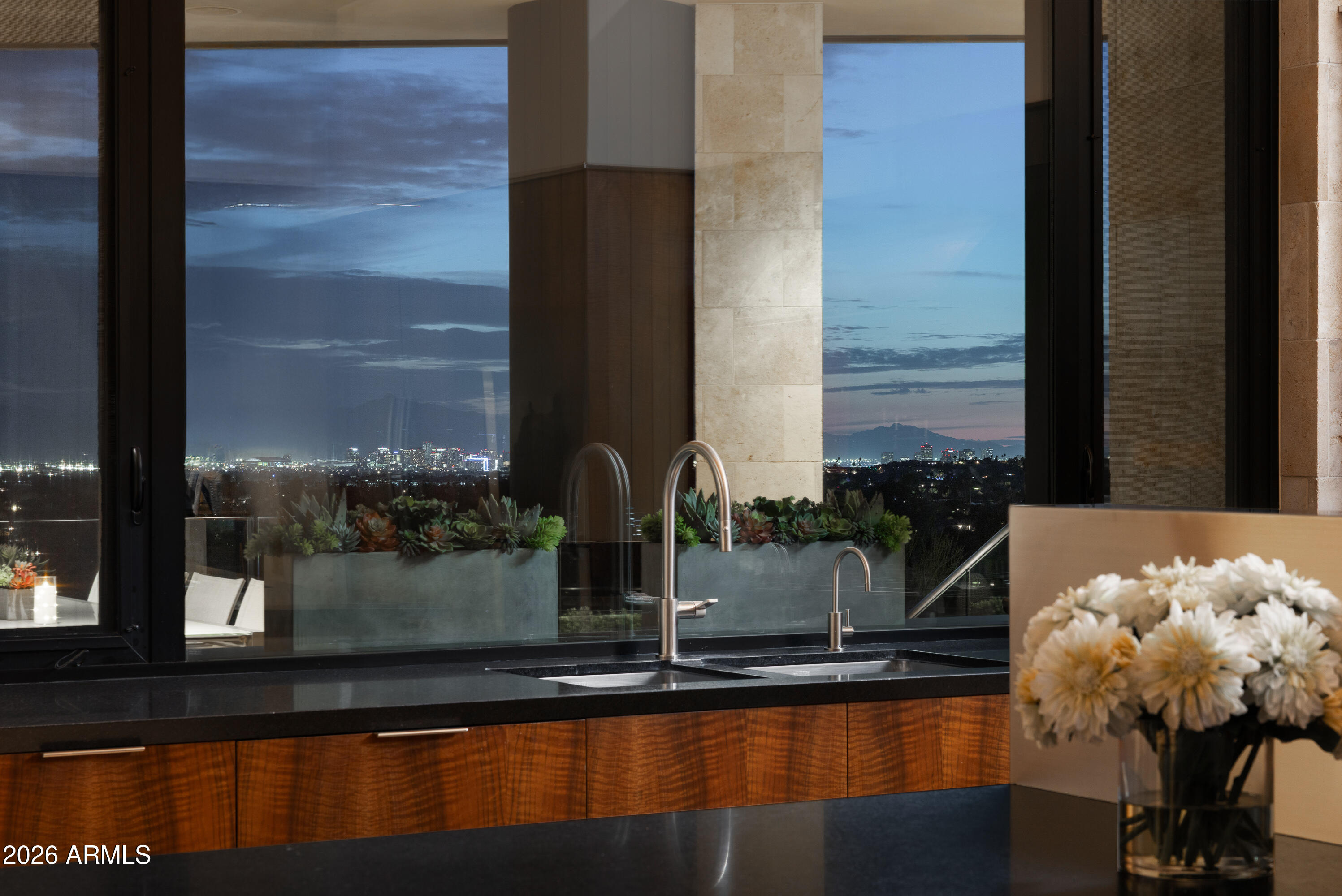 5248 East Arroyo Road Paradise Valley, AZ 85253 - Photo 10 of 31 a kitchen with a sink and cabinets