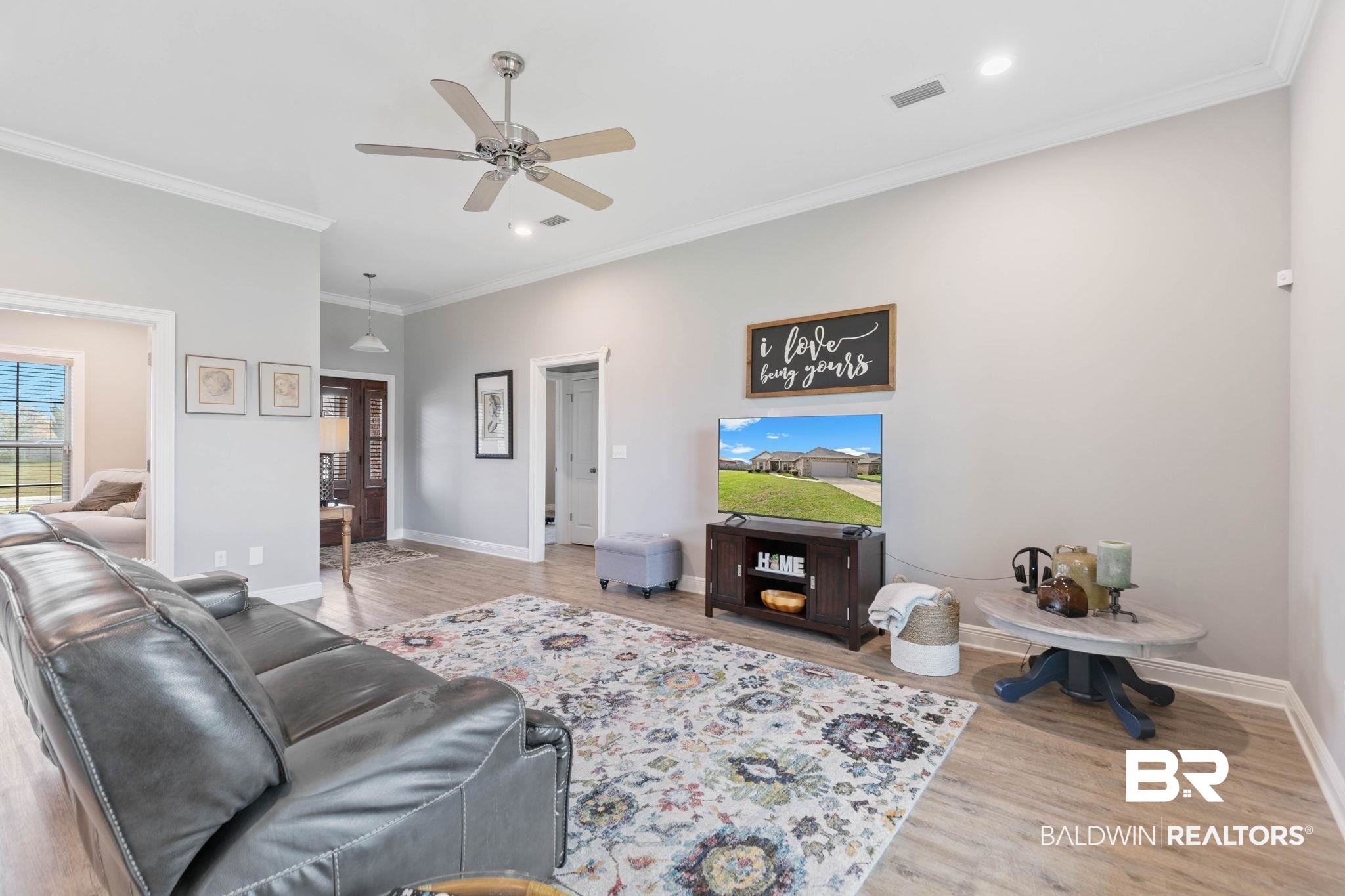 9388 Pembrook Loop Fairhope, AL 36532 - Photo 12 of 53 Living area with crown molding, light wood finished floors, ceiling fan, and recessed lighting