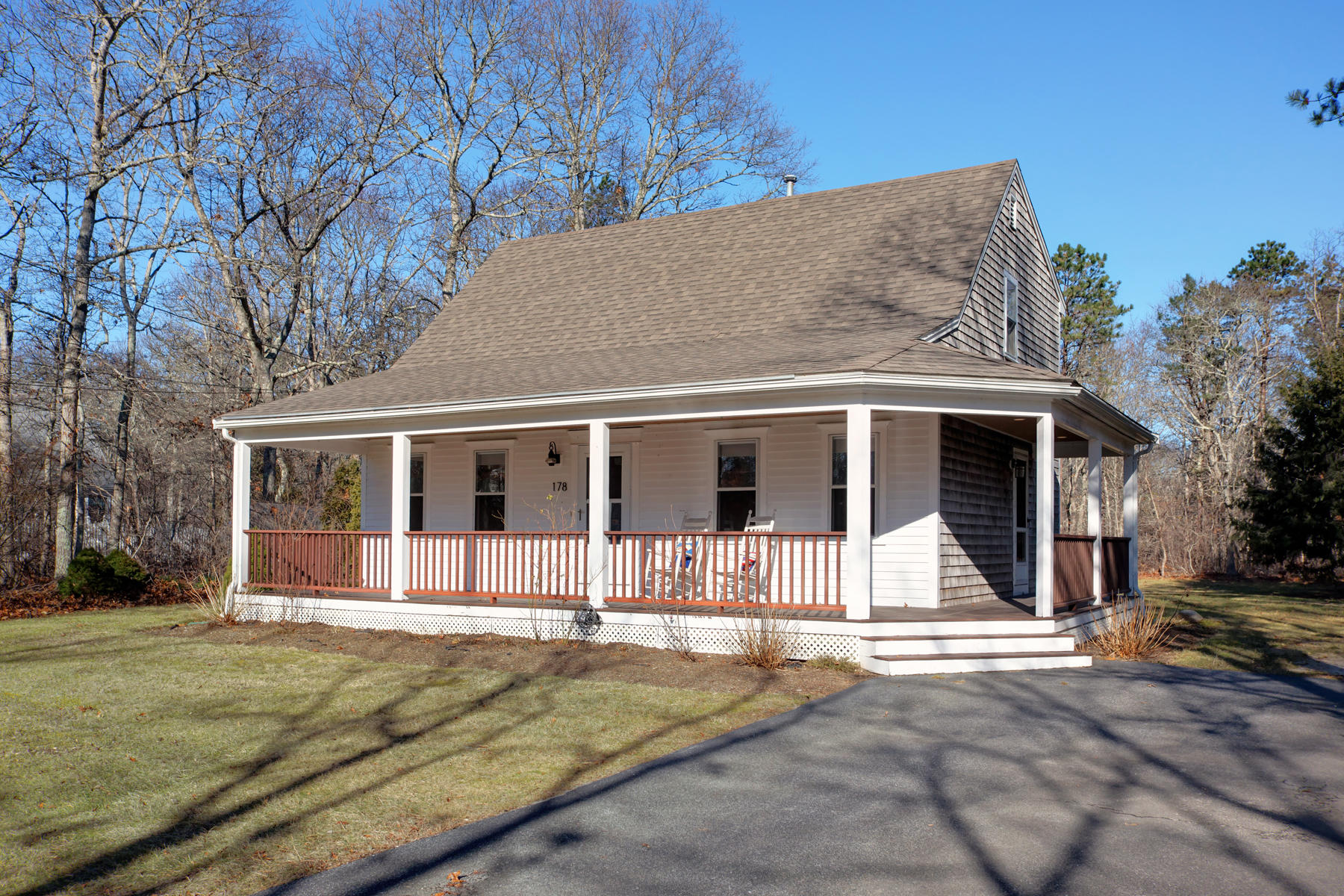 178 Farmersville Road Sandwich, MA 02563 - Photo 1 of 25 a front view of a house with a yard