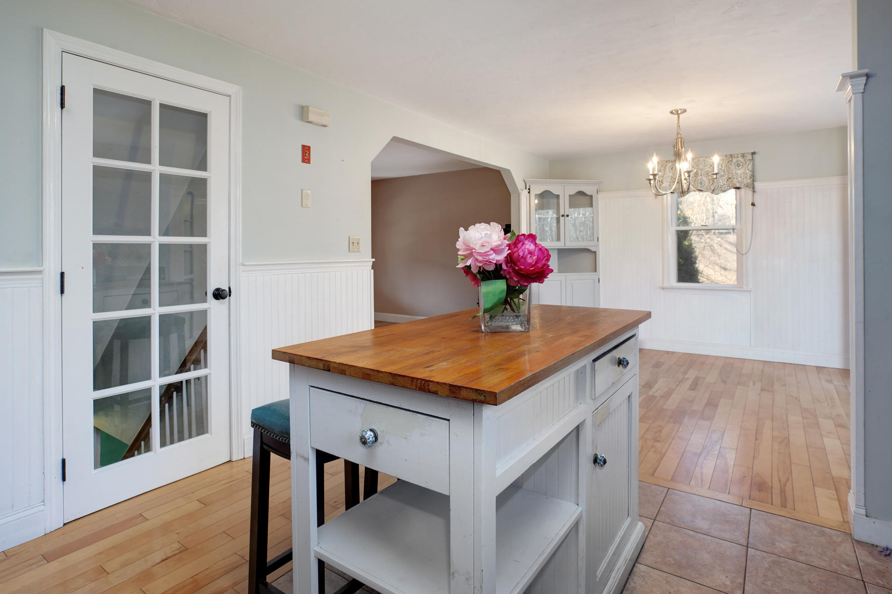 178 Farmersville Road Sandwich, MA 02563 - Photo 11 of 25 a view of kitchen island with furniture and wooden floor