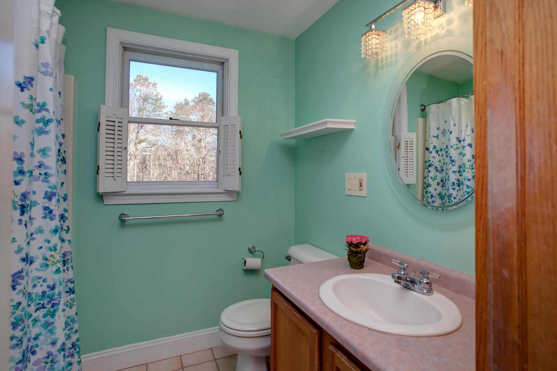 178 Farmersville Road Sandwich, MA 02563 - Photo 19 of 25 a bathroom with a sink a toilet and a mirror