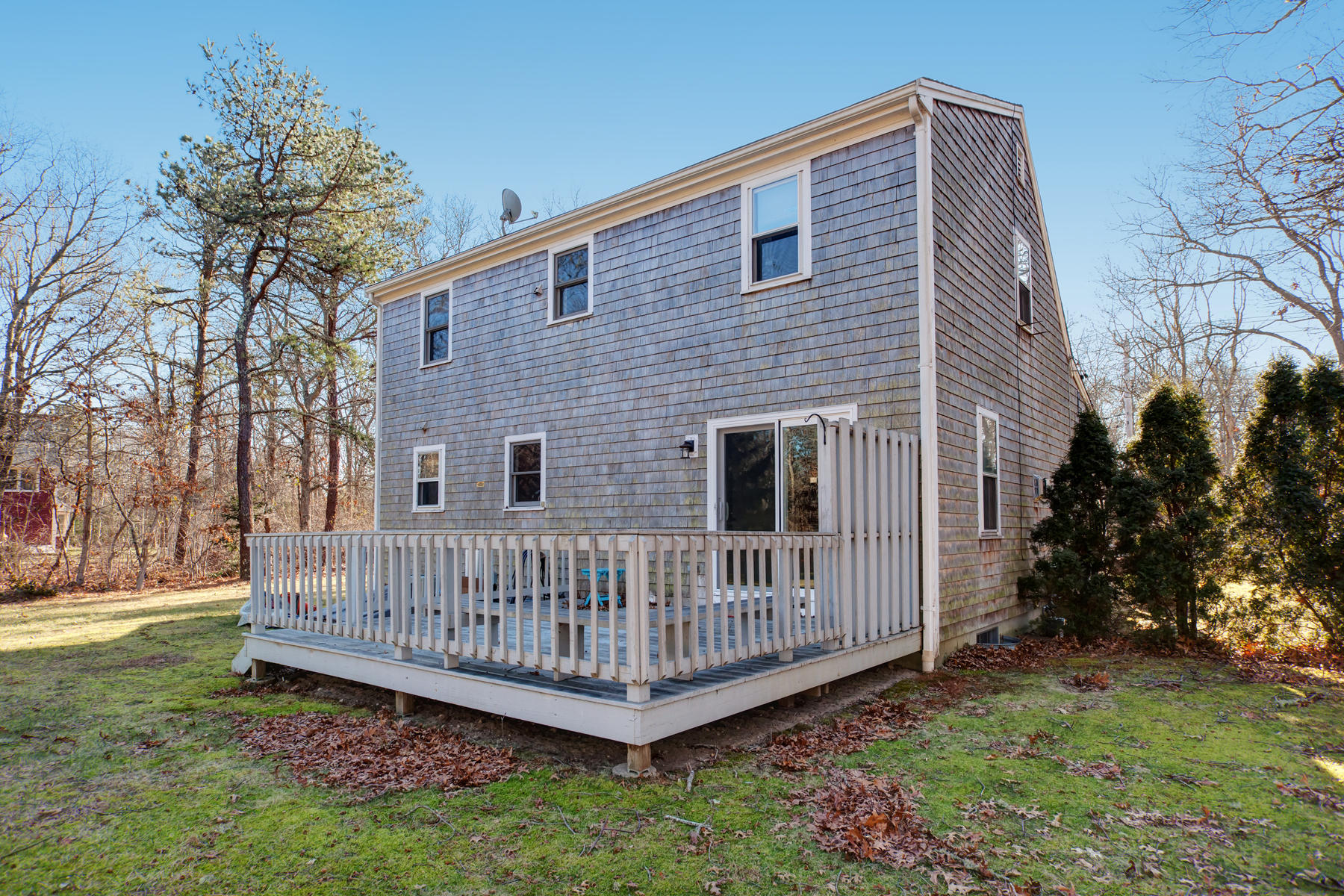 178 Farmersville Road Sandwich, MA 02563 - Photo 22 of 25 a view of a backyard with a small cabin