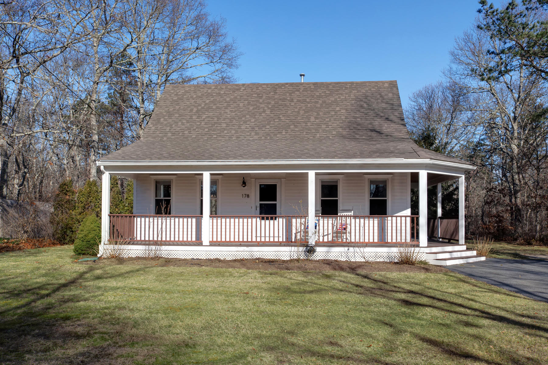 178 Farmersville Road Sandwich, MA 02563 - Photo 24 of 25 a front view of a house with a yard