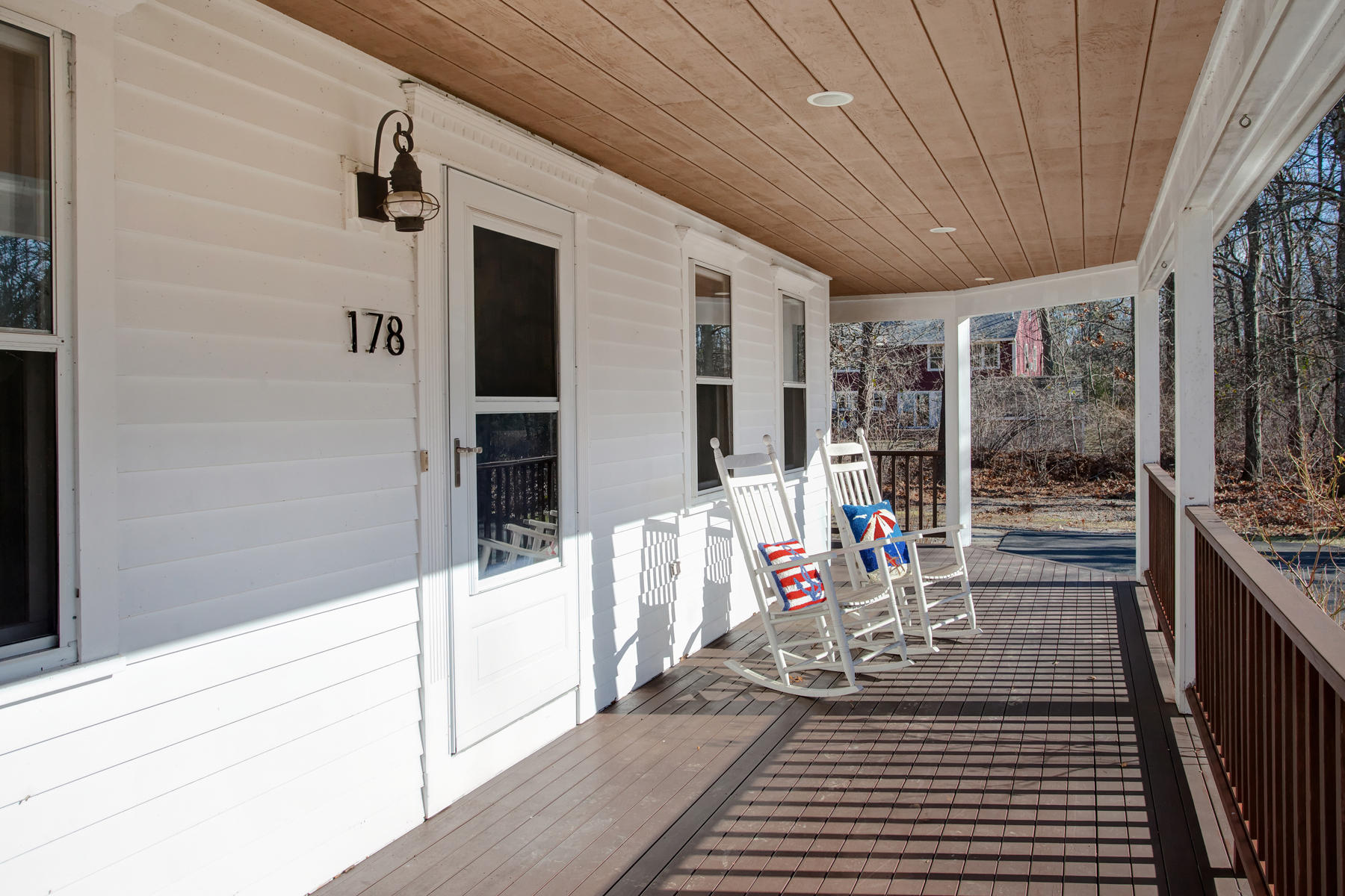 178 Farmersville Road Sandwich, MA 02563 - Photo 3 of 25 a view of a balcony with a couch and the porch