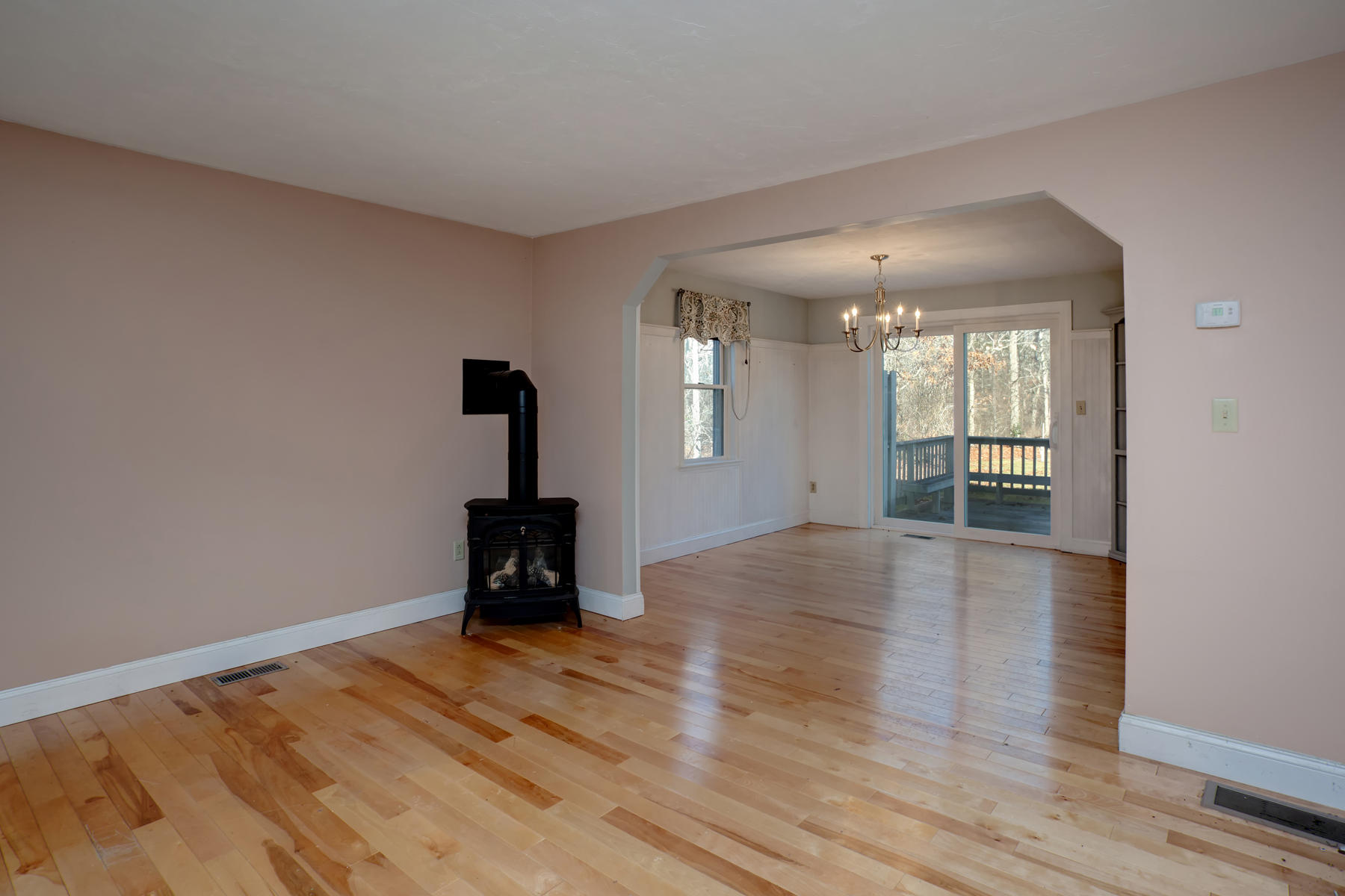 178 Farmersville Road Sandwich, MA 02563 - Photo 5 of 25 wooden floor in an empty room with a window